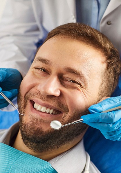 A man getting a dental checkup.